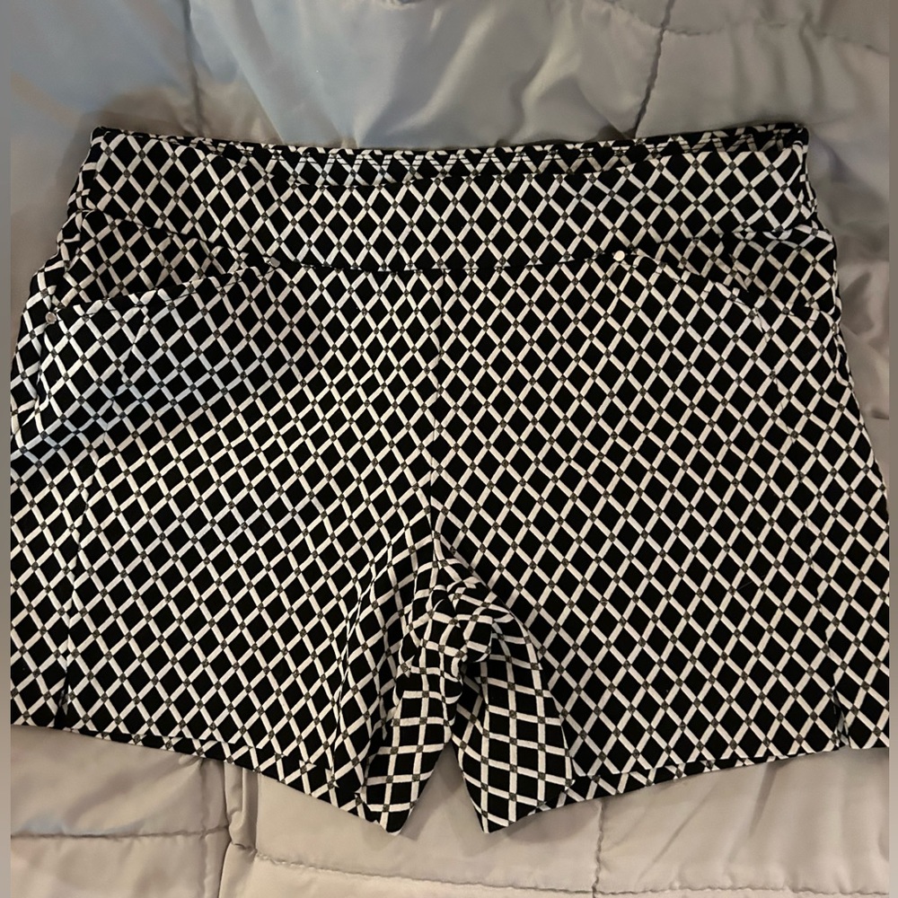 Pull-on size 6 INC shorts .  Black and white diamond pattern.  Stretchy fabric.